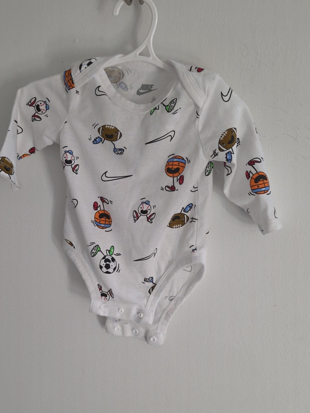Nike White Multi-Sport Print Long-Sleeve Baby Bodysuit